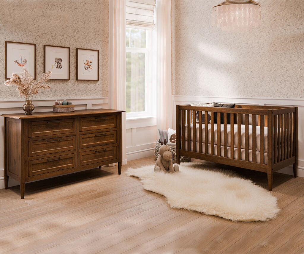 Nursery set with crib and dresser from a family-owned furniture store.