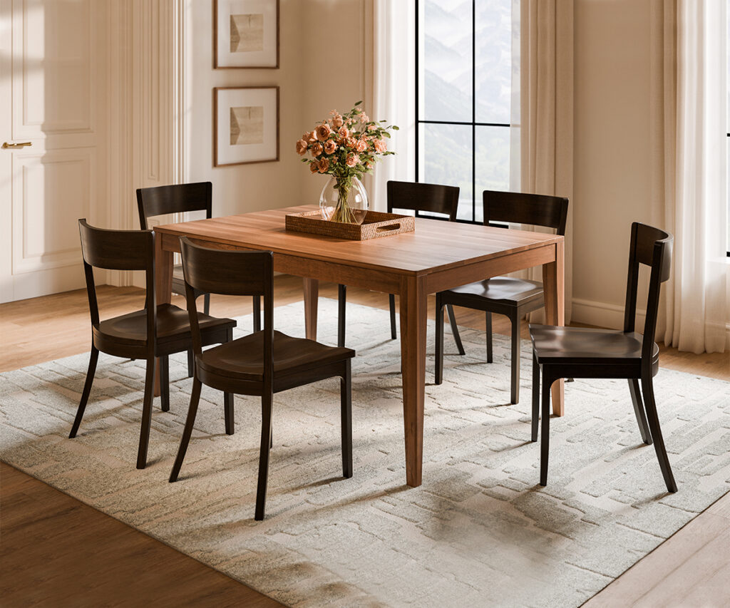 How to care for wood furniture: dining table set in bright room by window.
