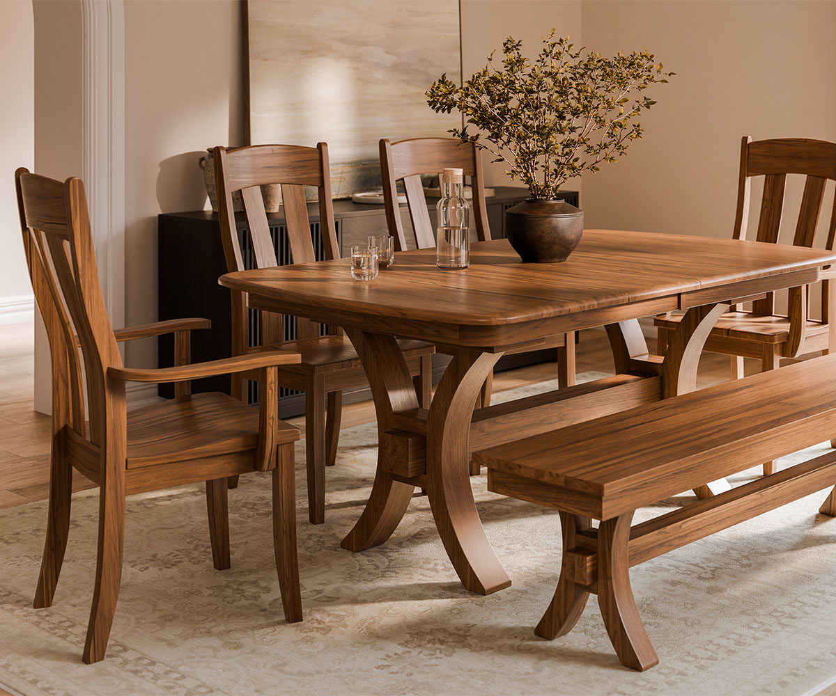 Solid hardwood dining table with bench and chairs in a warm modern dining room.