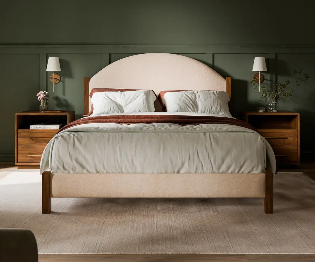 Upholstered wood bed with matching nightstands against a dark green wall.