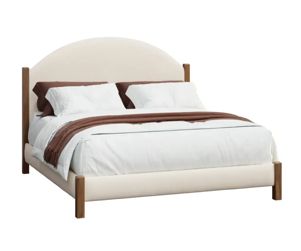 Cream upholstered bed with a curved headboard, wood accents, and white bedding