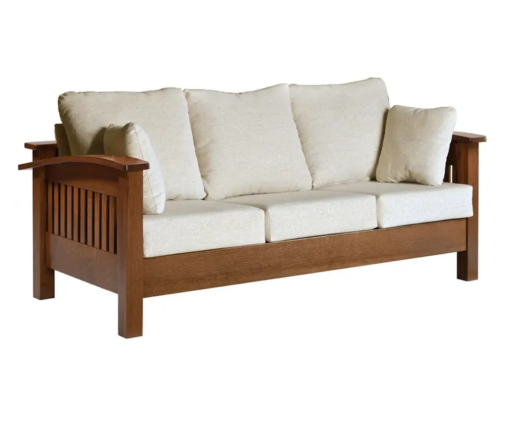 Wood-framed sofa with cream upholstered cushions and slatted side details